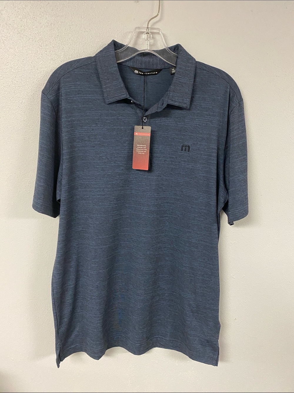 Travis Mathew Men's Heather Navy Polo. NWT Size M